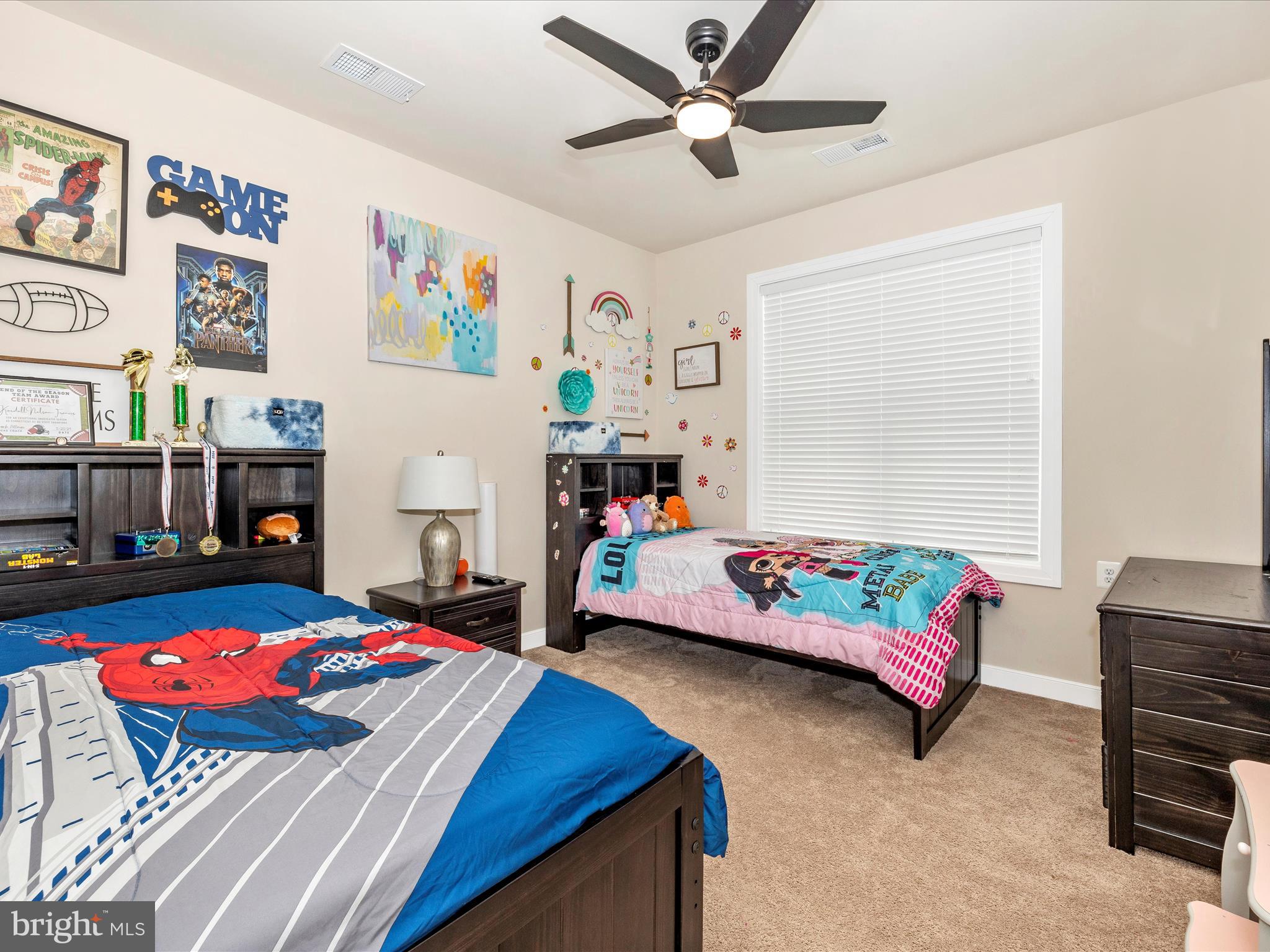 11147 Hazelnut Lane Monrovia, MD 21770 - Photo 27 of 66 a bedroom with bed and a couch