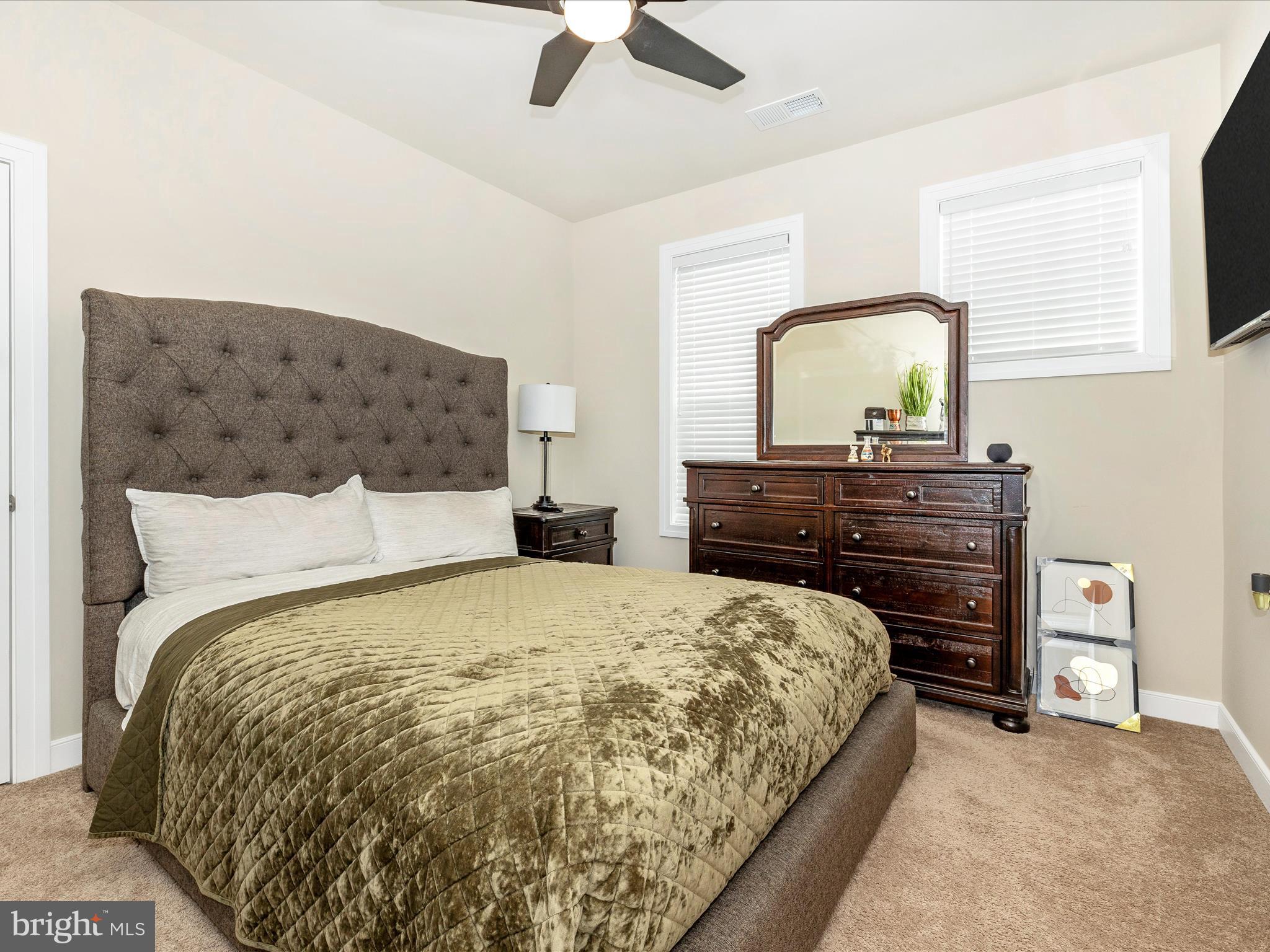 11147 Hazelnut Lane Monrovia, MD 21770 - Photo 31 of 66 a bedroom with a bed and dresser