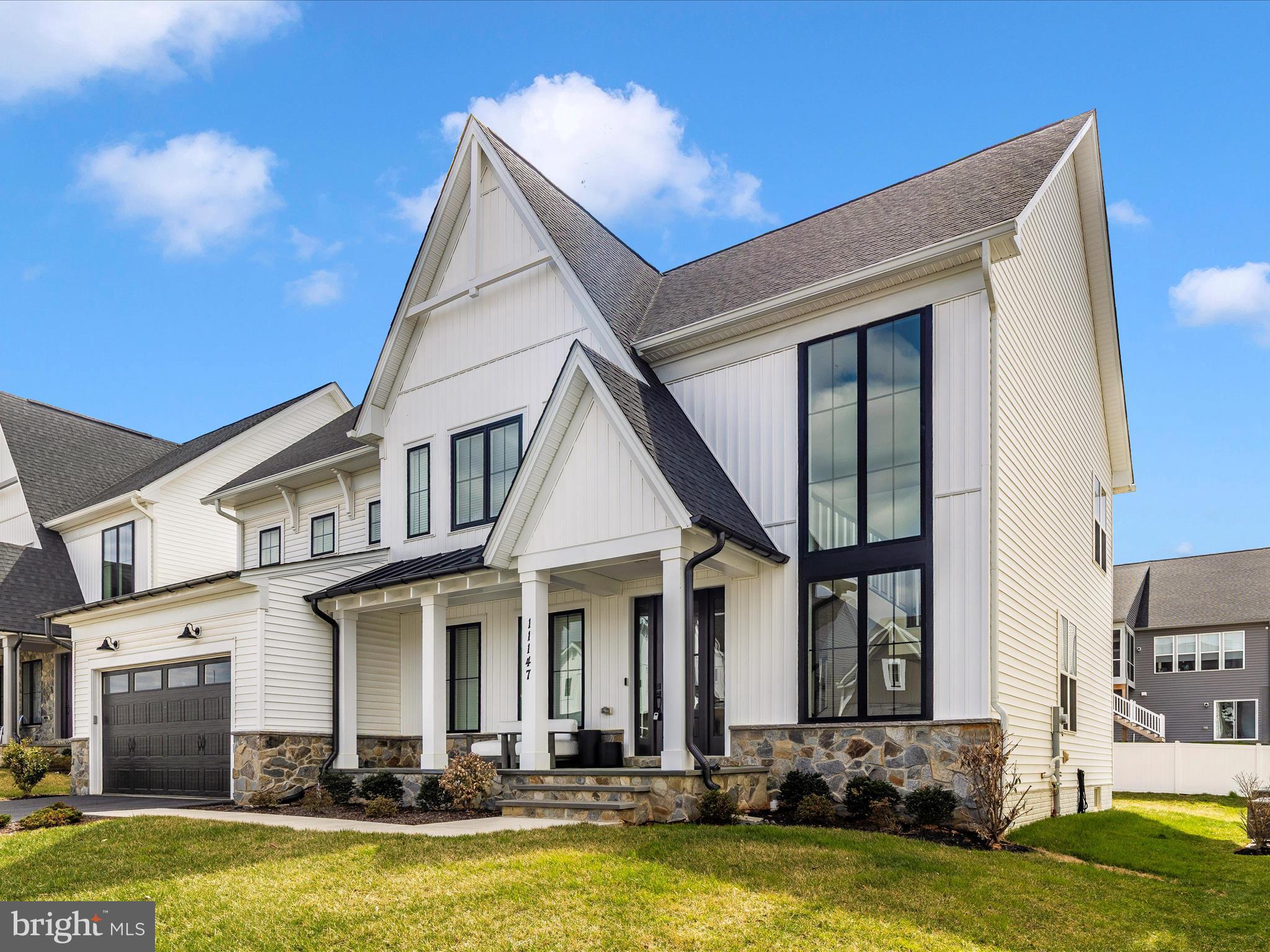 11147 Hazelnut Lane Monrovia, MD 21770 - Photo 44 of 66 a view of a white building with swimming pool in front of it