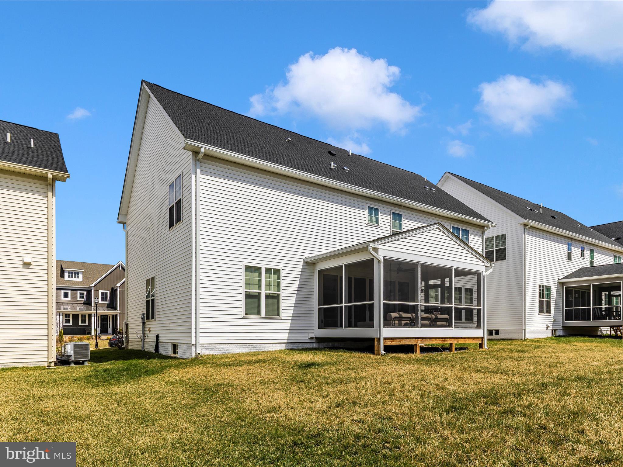 11147 Hazelnut Lane Monrovia, MD 21770 - Photo 53 of 66 a view of a house with a large window and yard
