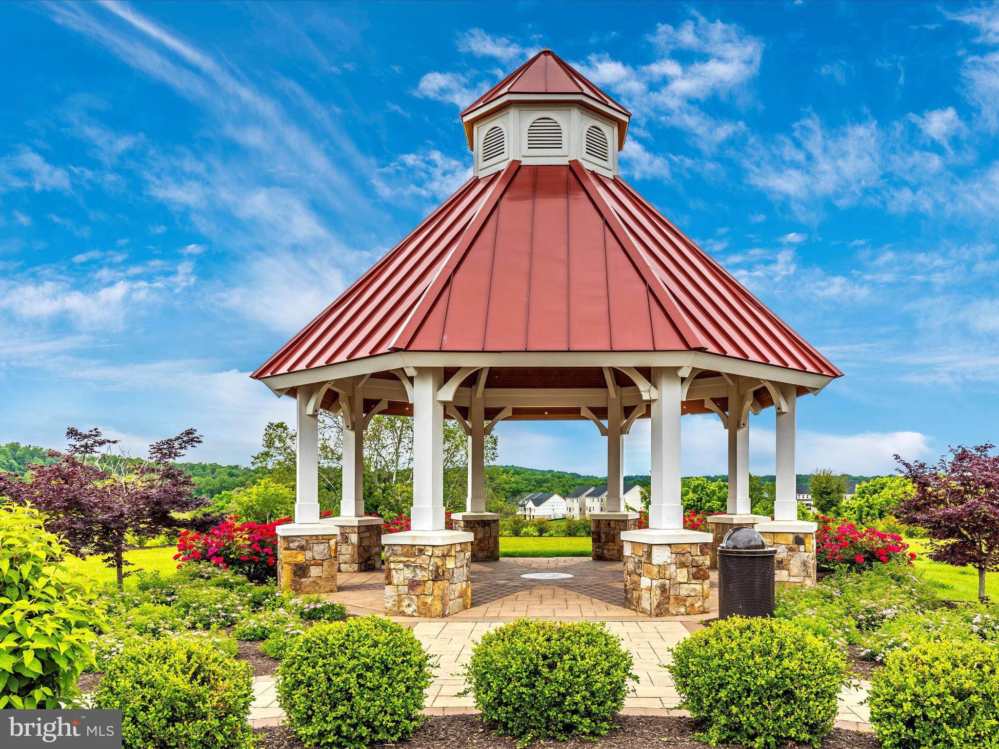 11147 Hazelnut Lane Monrovia, MD 21770 - Photo 57 of 66 a view of a table and chairs under an umbrella in the terrace