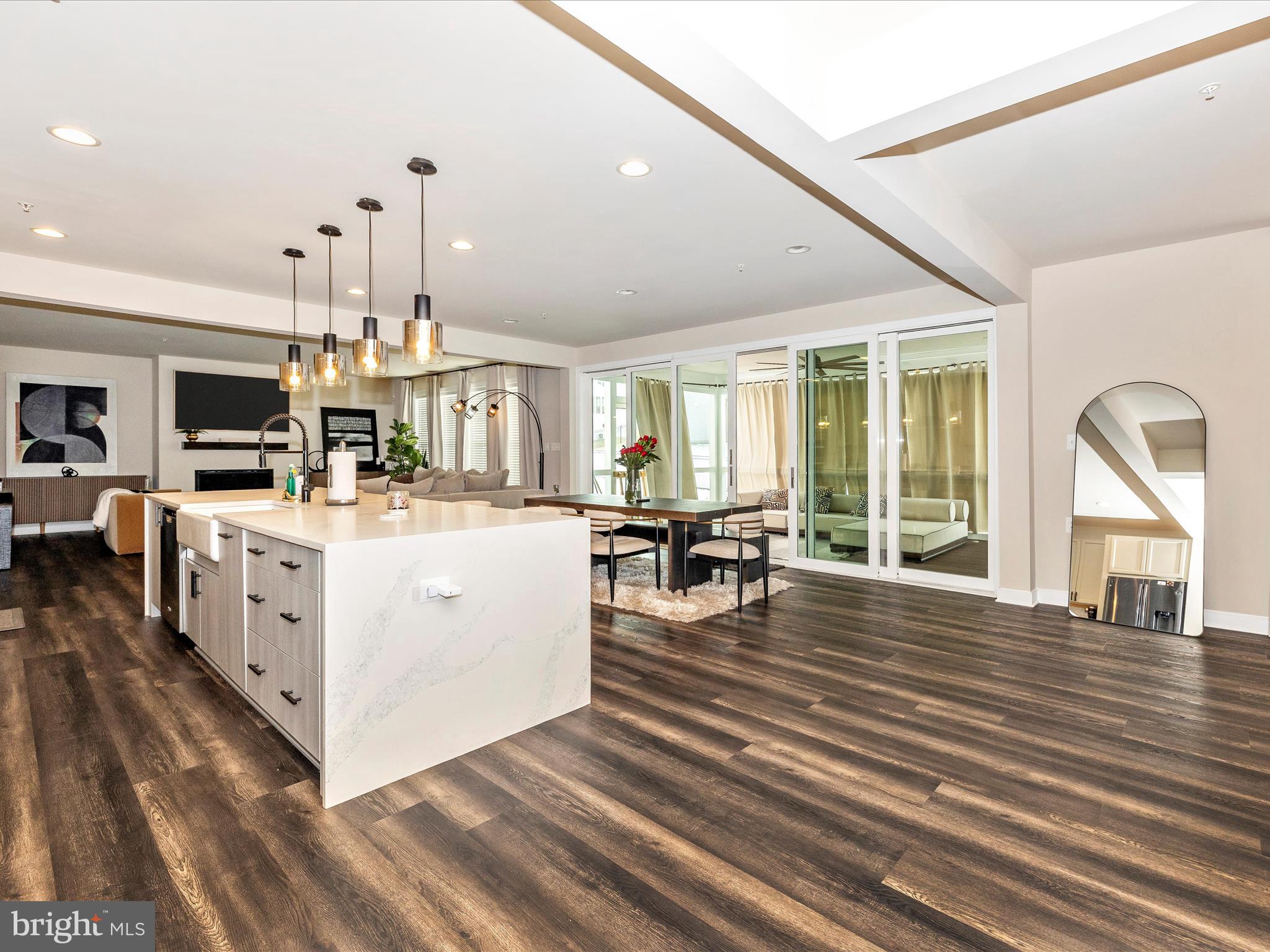 11147 Hazelnut Lane Monrovia, MD 21770 - Photo 6 of 66 a large white kitchen with kitchen island a large island in it