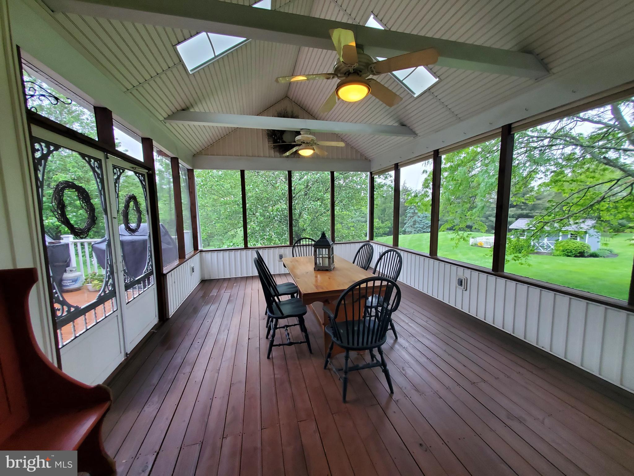 1009 Branch Mill Road Telford, PA 18969 - Photo 17 of 65 a view of a dining room with furniture window and wooden floor