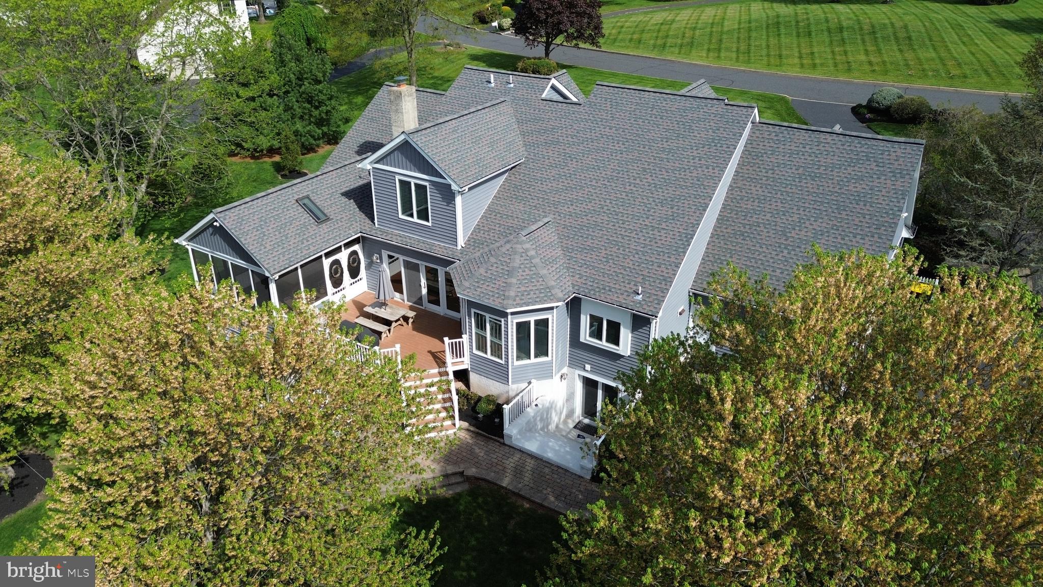 1009 Branch Mill Road Telford, PA 18969 - Photo 6 of 65 an aerial view of a house with a yard and potted plants