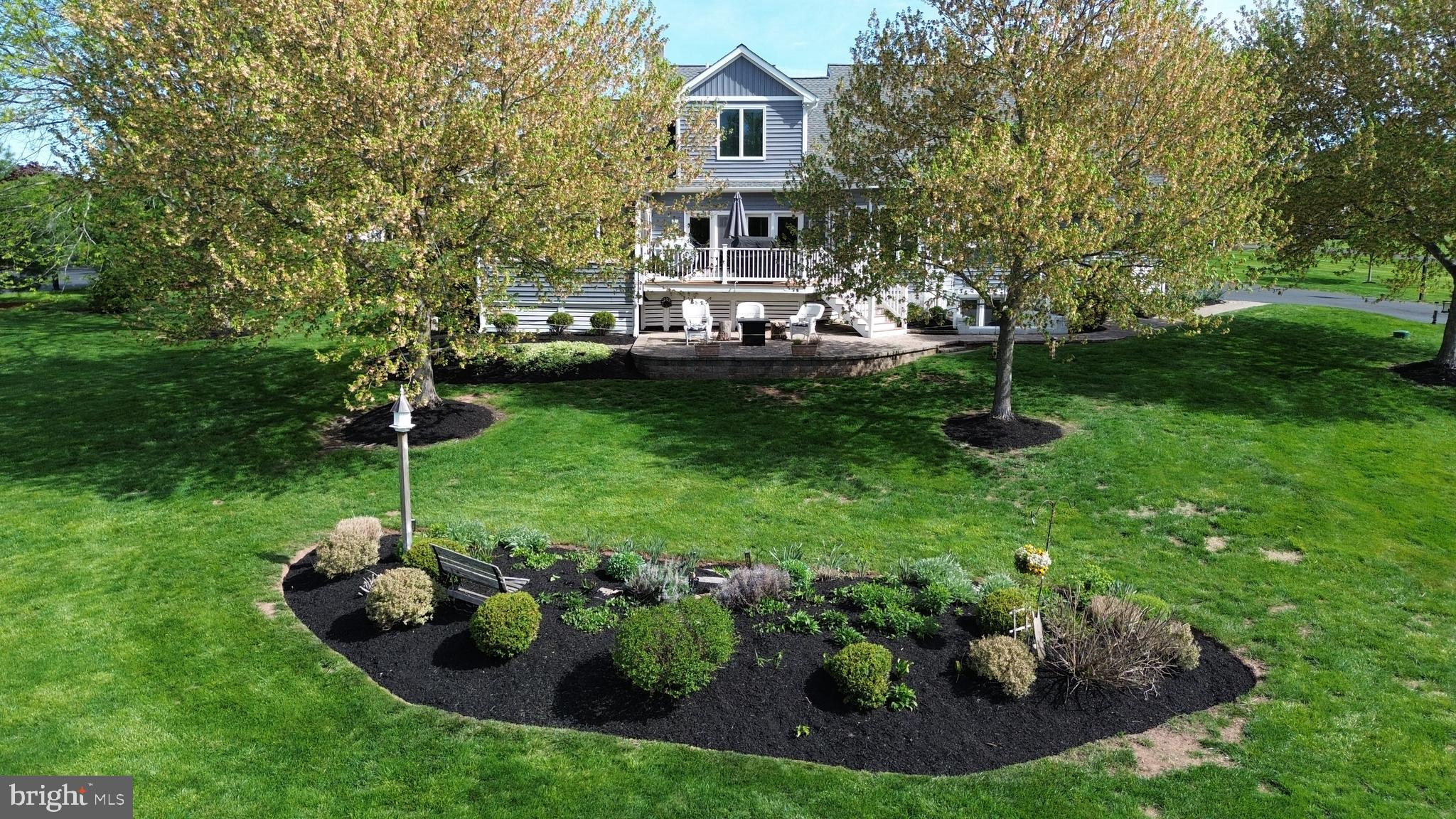 1009 Branch Mill Road Telford, PA 18969 - Photo 7 of 65 a view of a house with a backyard and a fountain