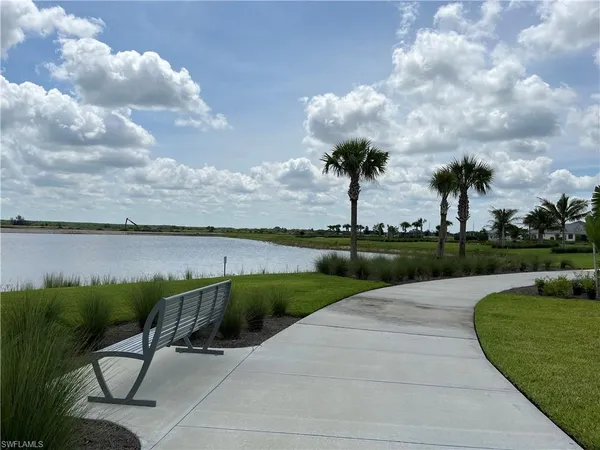 a view of a terrace with palm trees