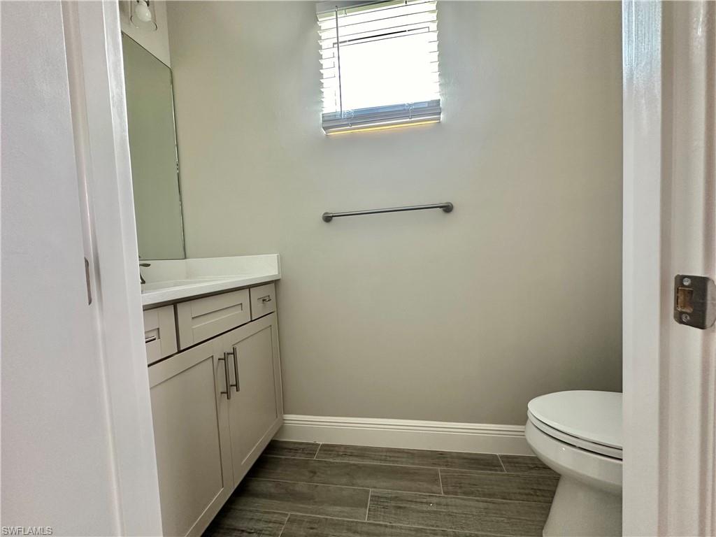 4580 Centaurus Circle Naples, FL 34120 - Photo 9 of 25 a bathroom with a toilet