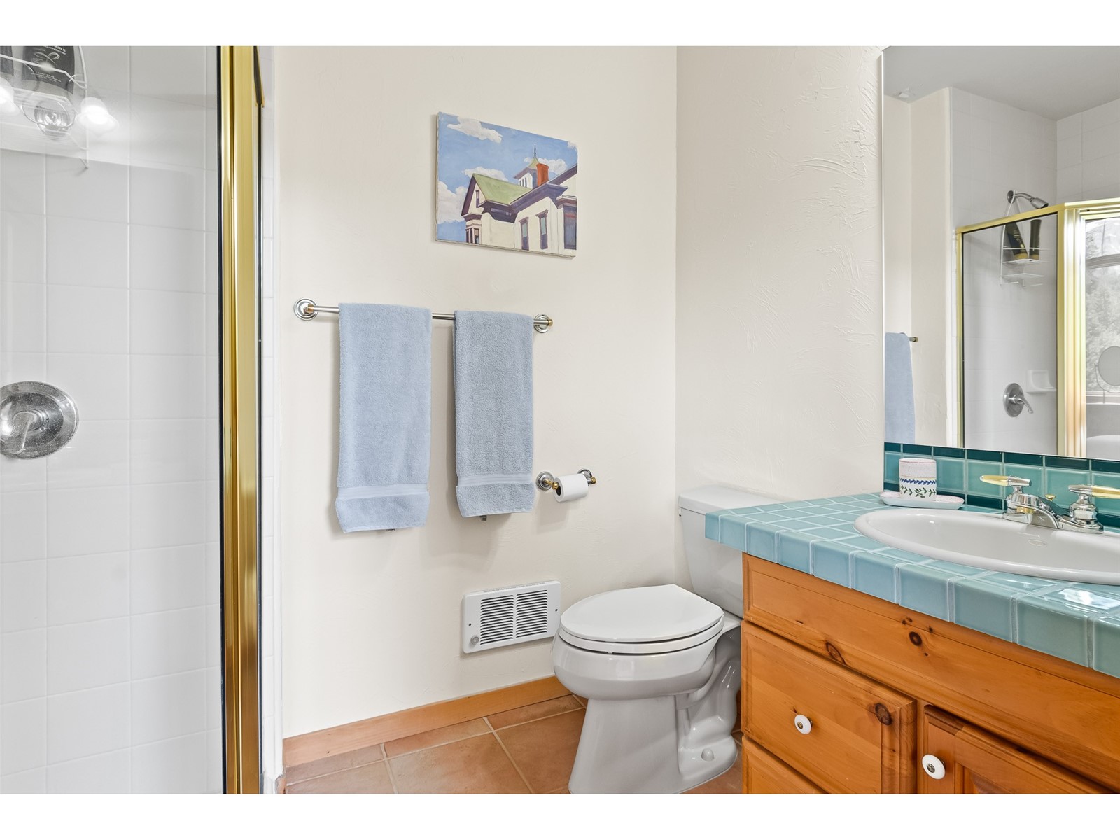 1746 South Ruby Road Silverthorne, CO 80498 - Photo 39 of 50 Bathroom featuring tile flooring, an enclosed shower, toilet, and large vanity