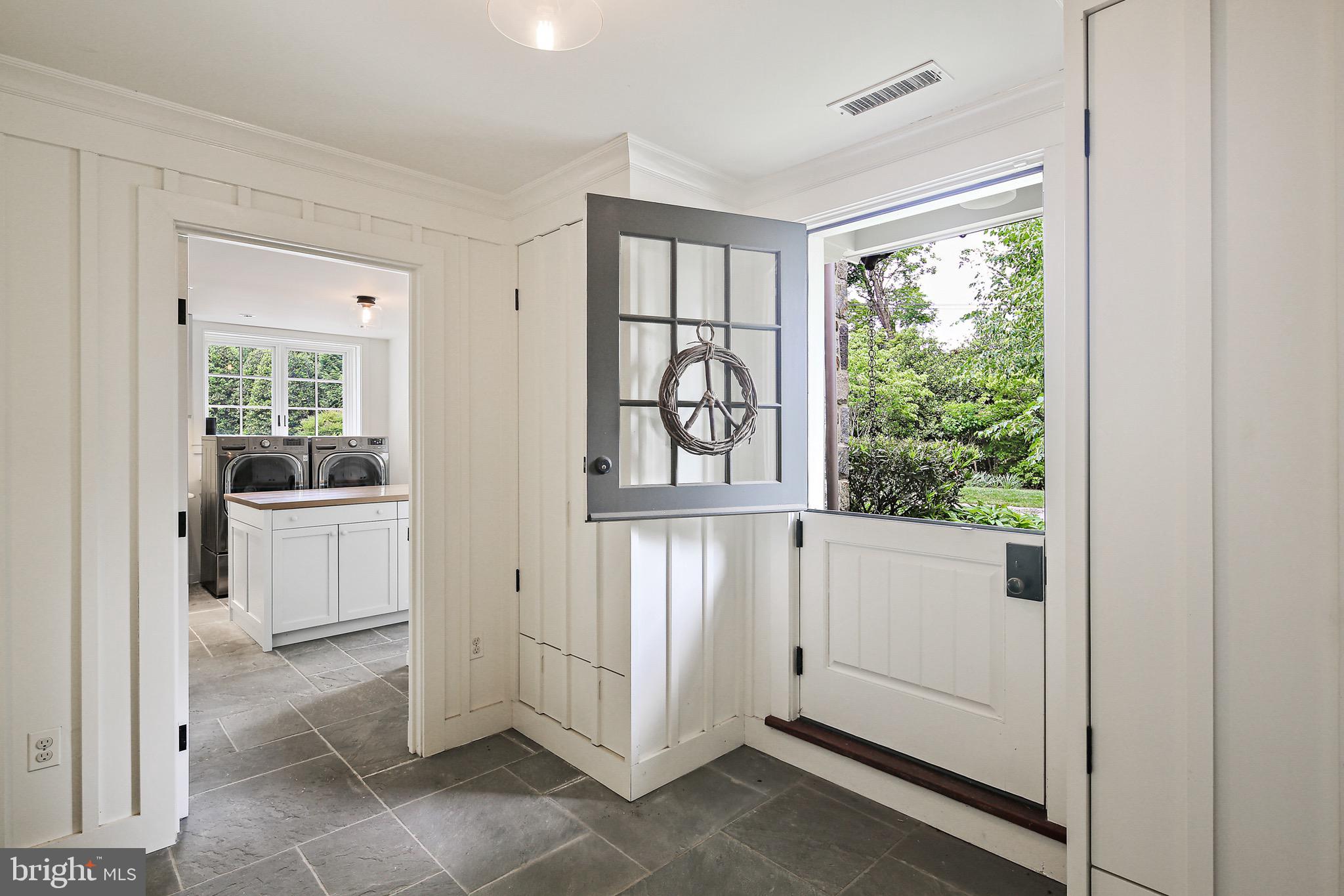 900 Army Road Baltimore, MD 21204 - Photo 47 of 99 Quaint Dutch-door leading to side parking + garden