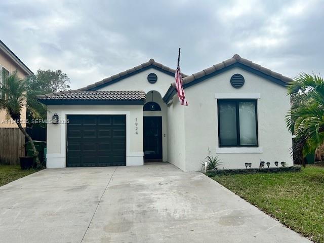 1924 Southeast 11th Street Homestead, FL 33035 - Photo 1 of 21 a front view of a house with a yard