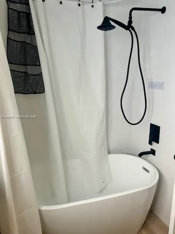 a bathroom with a bathtub