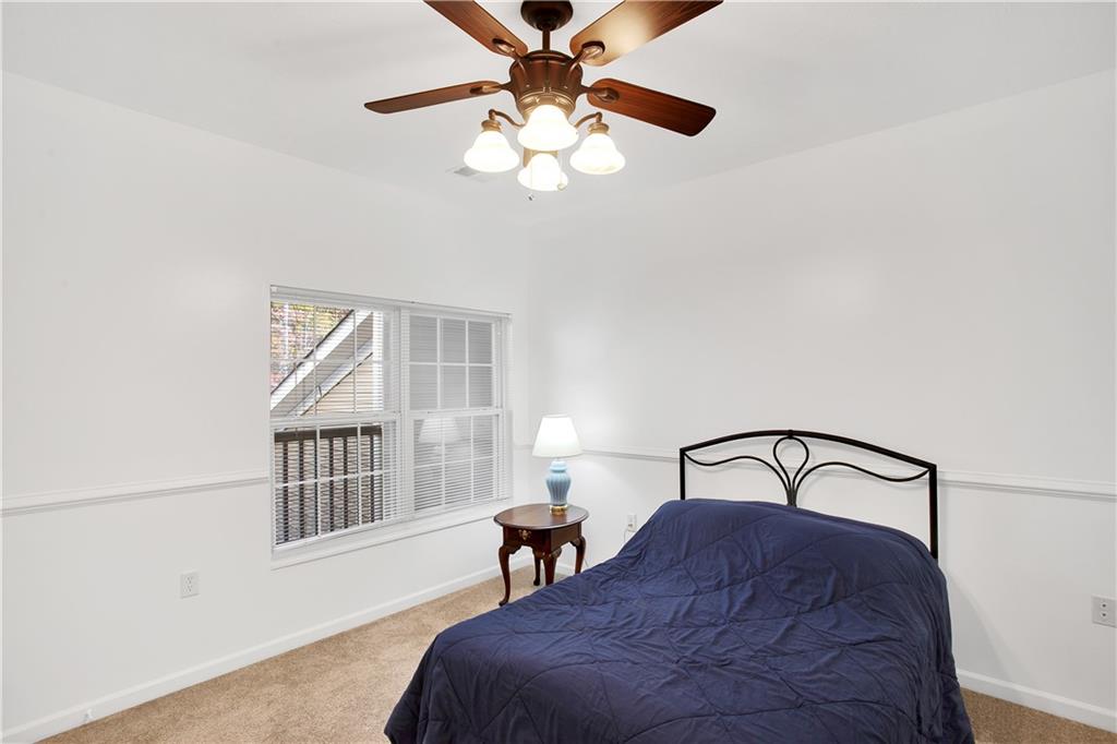 808 Stockton Ridge Cranberry Township, PA 16066 - Photo 18 of 25 a bedroom with a bed and window