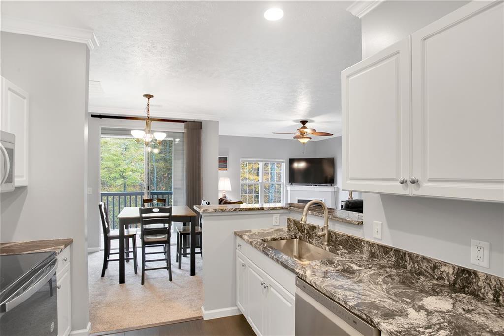 808 Stockton Ridge Cranberry Township, PA 16066 - Photo 9 of 25 a kitchen with granite countertop lots of counter top space and dining table