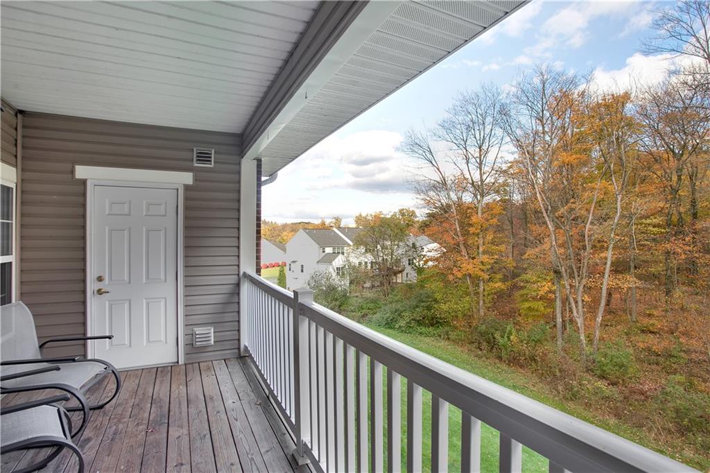 808 Stockton Ridge Cranberry Township, PA 16066 - Photo 10 of 25 a view of a balcony with wooden floor