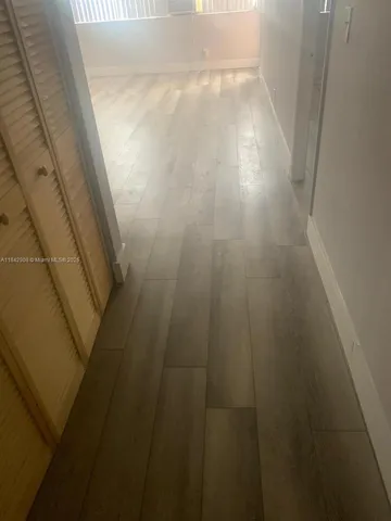 a stove top oven sitting inside of a kitchen