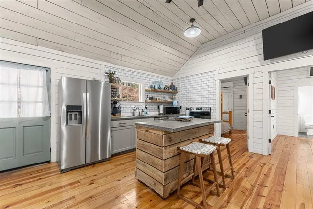 a kitchen with a stove and a sink