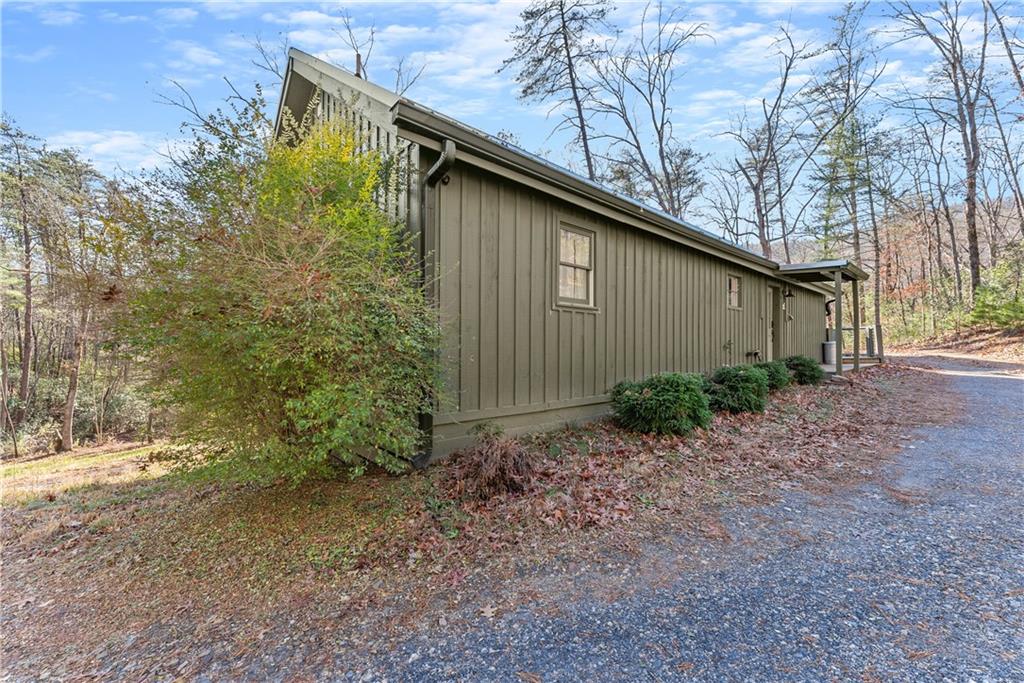 121 Waterfalls Way Clarkesville, GA 30523 - Photo 44 of 60 a backyard of a house with lots of green space