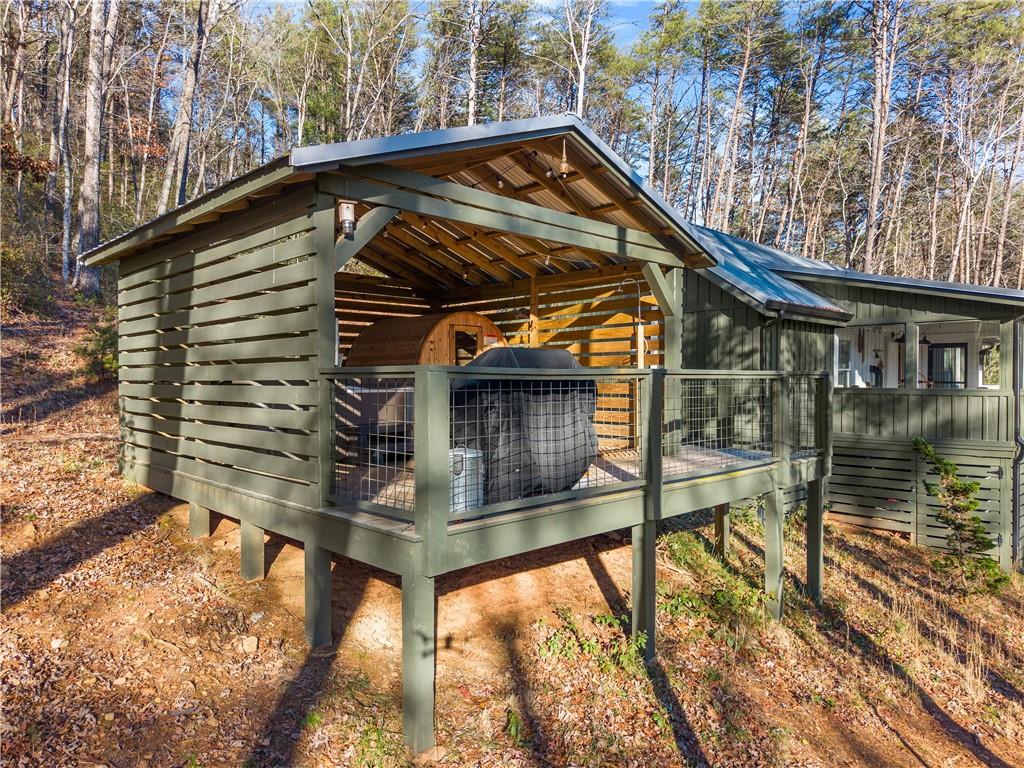 121 Waterfalls Way Clarkesville, GA 30523 - Photo 9 of 60 a view of house with a small yard