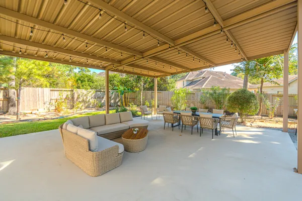 a view of a swimming pool with chairs