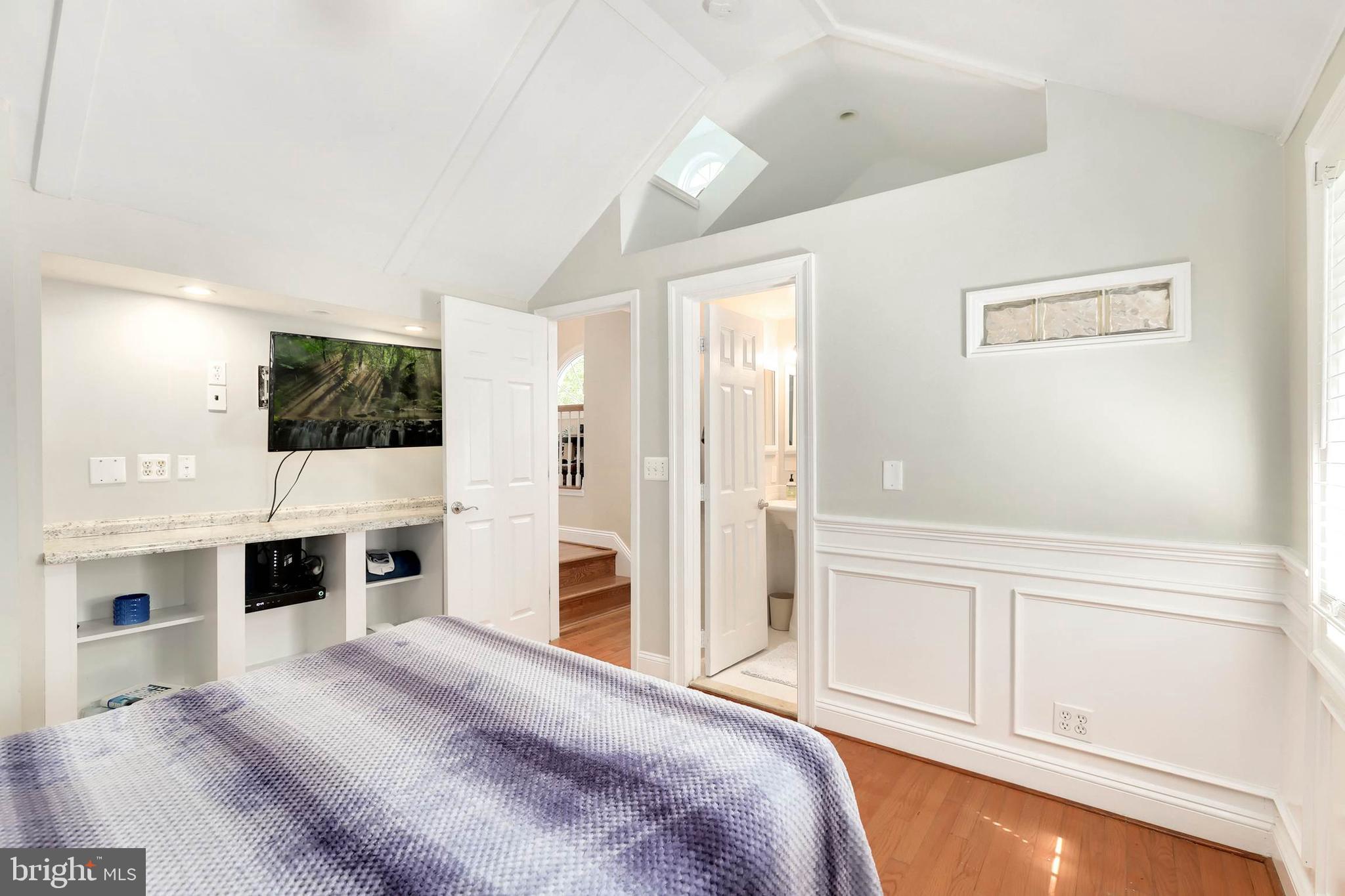 4 High Street Round Hill, VA 20141 - Photo 12 of 51 a large white bedroom with bed and tv