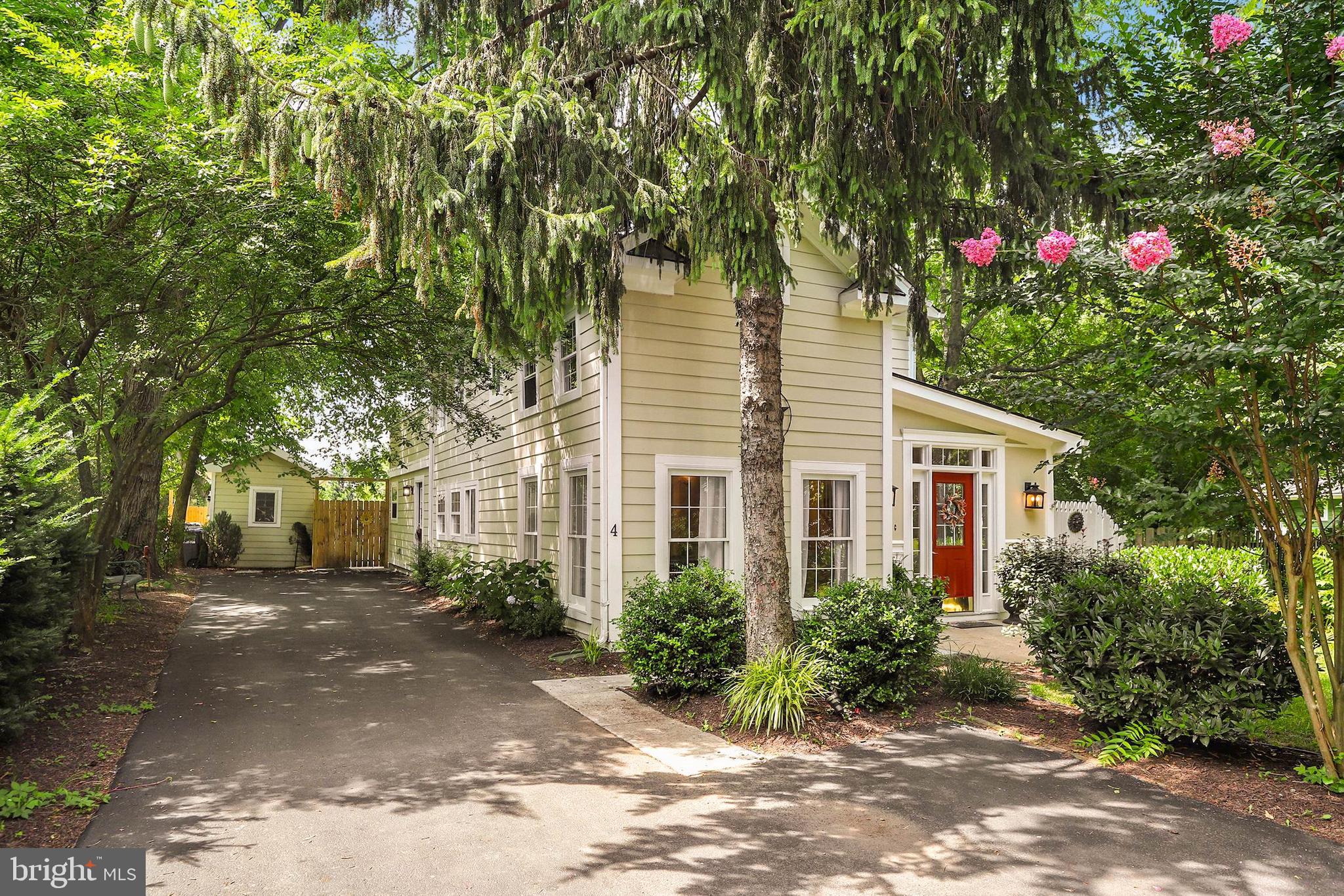 4 High Street Round Hill, VA 20141 - Photo 3 of 51 a front view of a house with a yard and potted plants