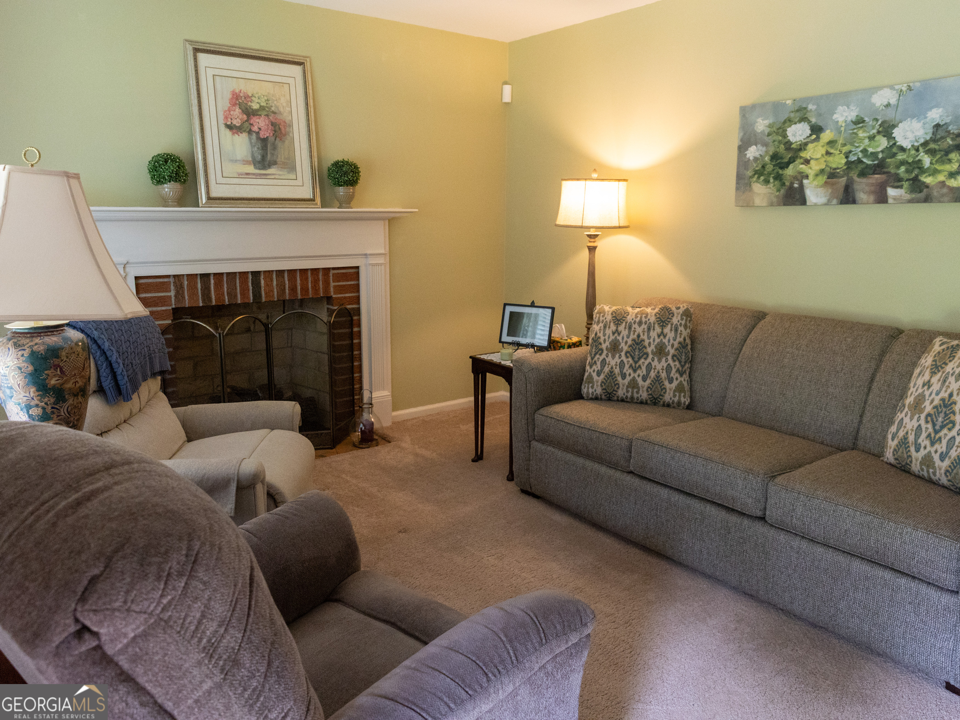 508 Ridgecrest Drive Elberton, GA 30635 - Photo 9 of 29 a living room with furniture and a fireplace