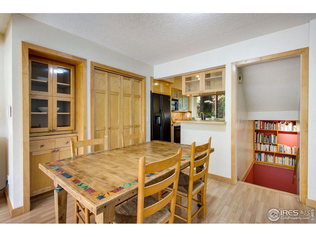 2659 Juniper Avenue, Unit 30 Boulder, CO 80304 - Photo 13 of 35 a dining room with a table and chairs