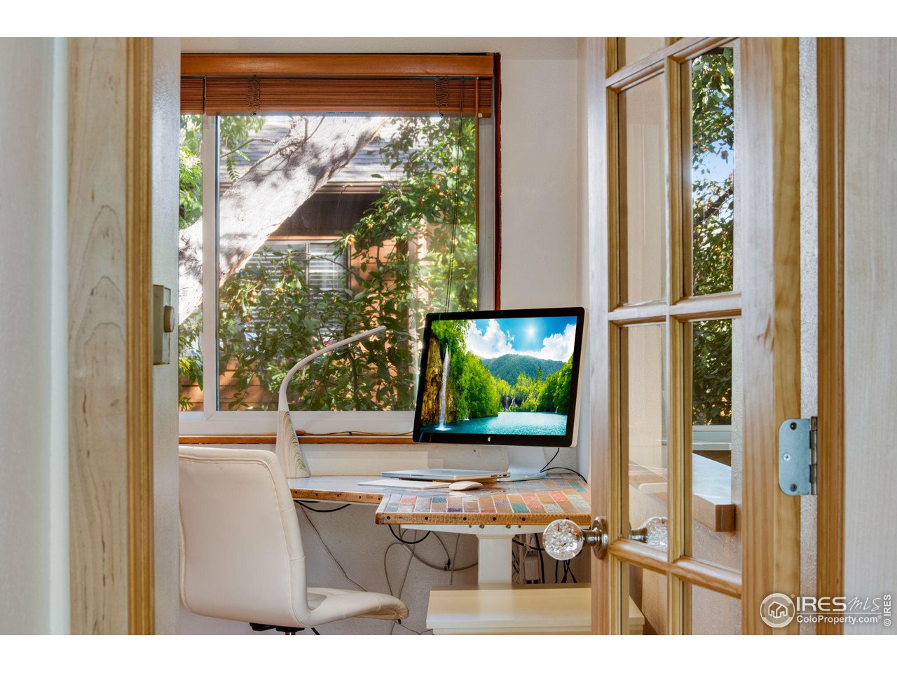 2659 Juniper Avenue, Unit 30 Boulder, CO 80304 - Photo 19 of 35 a living room filled with furniture and a window