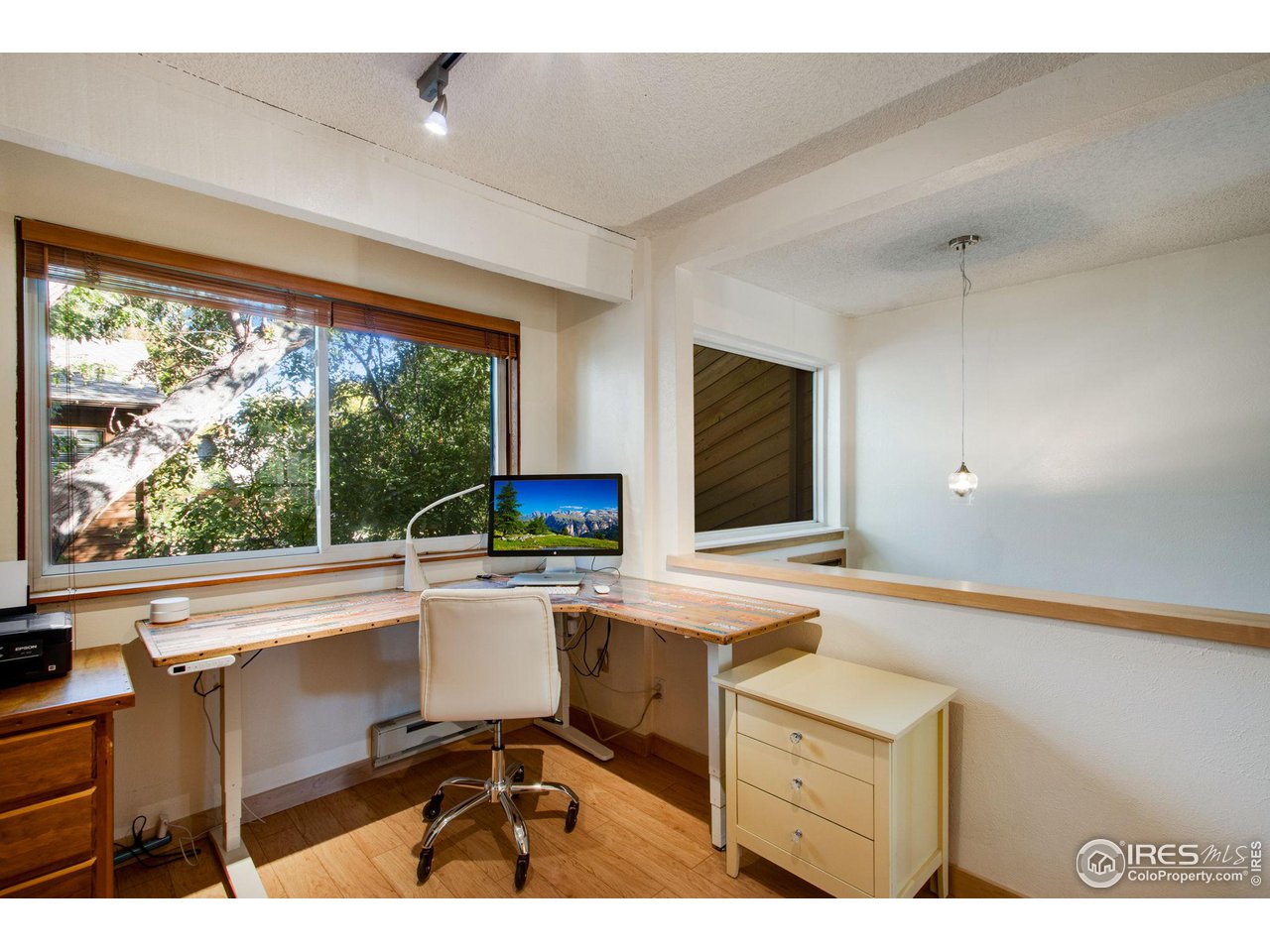 2659 Juniper Avenue, Unit 30 Boulder, CO 80304 - Photo 21 of 35 a kitchen with a sink cabinets and wooden floor