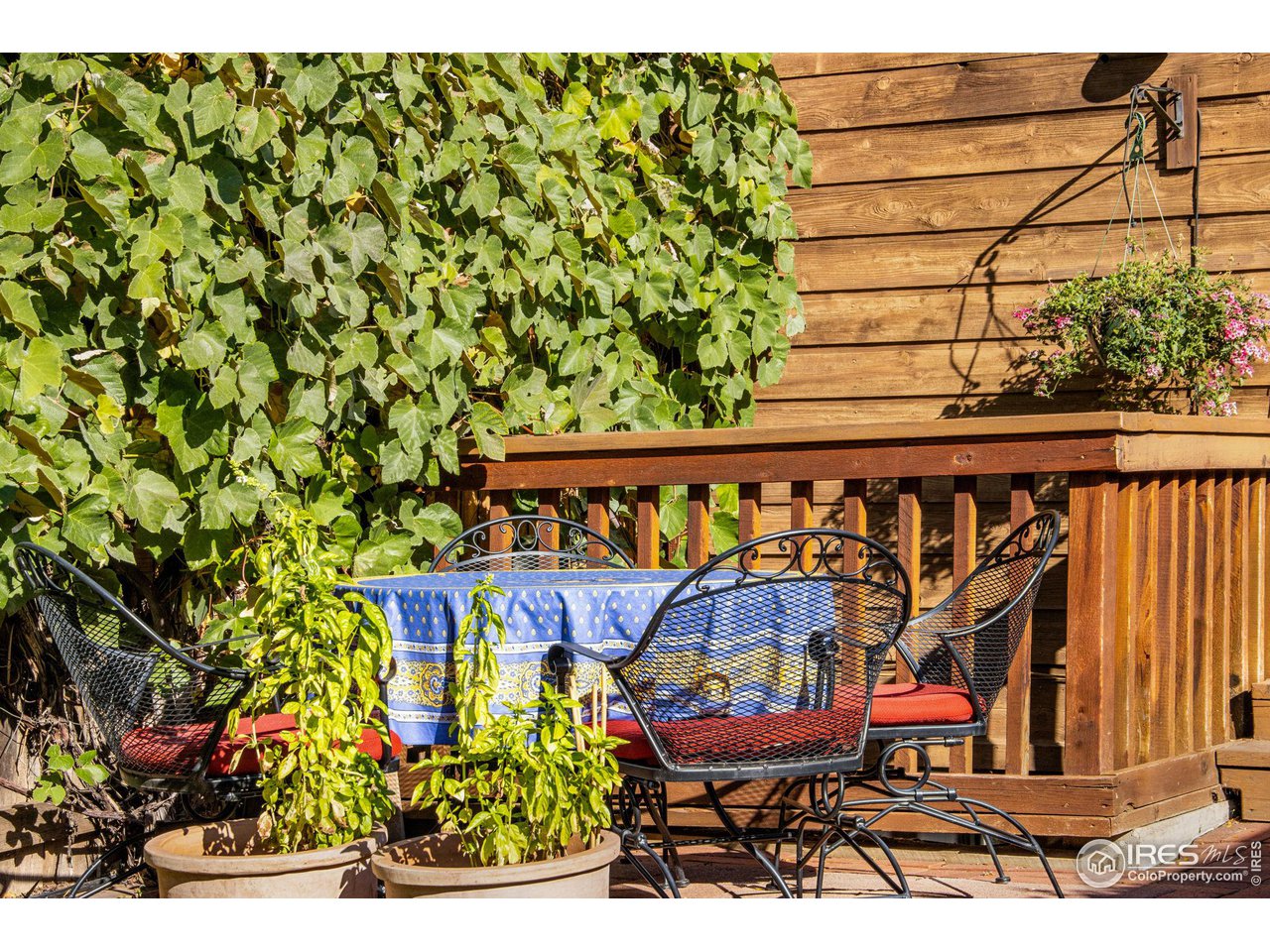2659 Juniper Avenue, Unit 30 Boulder, CO 80304 - Photo 28 of 35 view of a patio with glass top table and chairs
