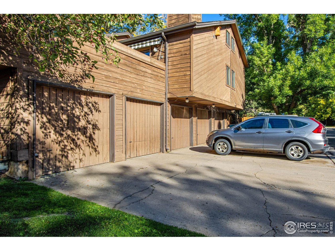 2659 Juniper Avenue, Unit 30 Boulder, CO 80304 - Photo 29 of 35 a view of a car parked in front of a house