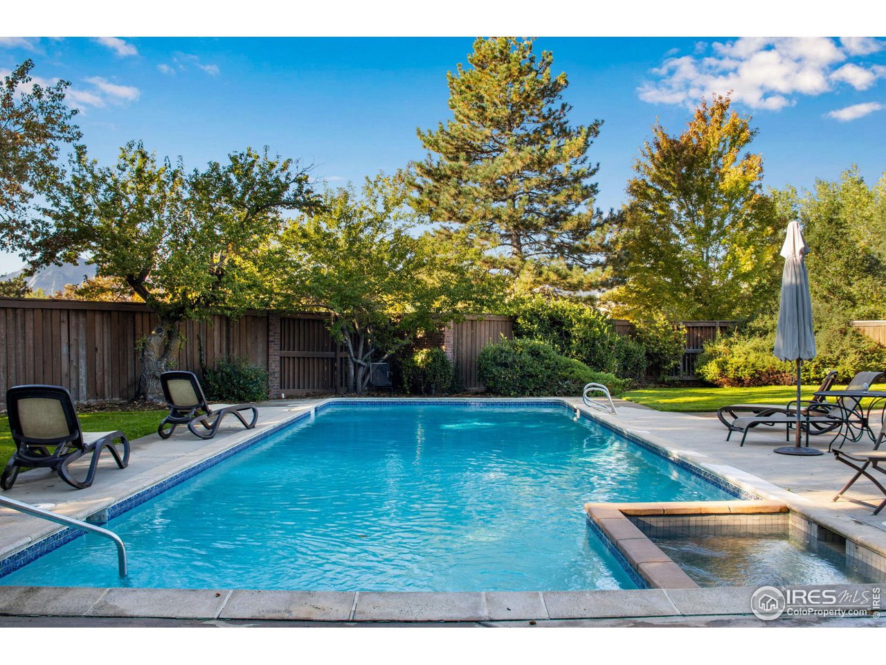 2659 Juniper Avenue, Unit 30 Boulder, CO 80304 - Photo 30 of 35 swimming pool view with a seating space