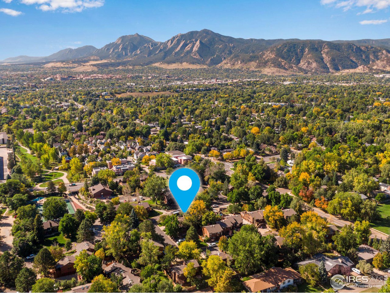 2659 Juniper Avenue, Unit 30 Boulder, CO 80304 - Photo 33 of 35 a view of a city with a mountain in the background