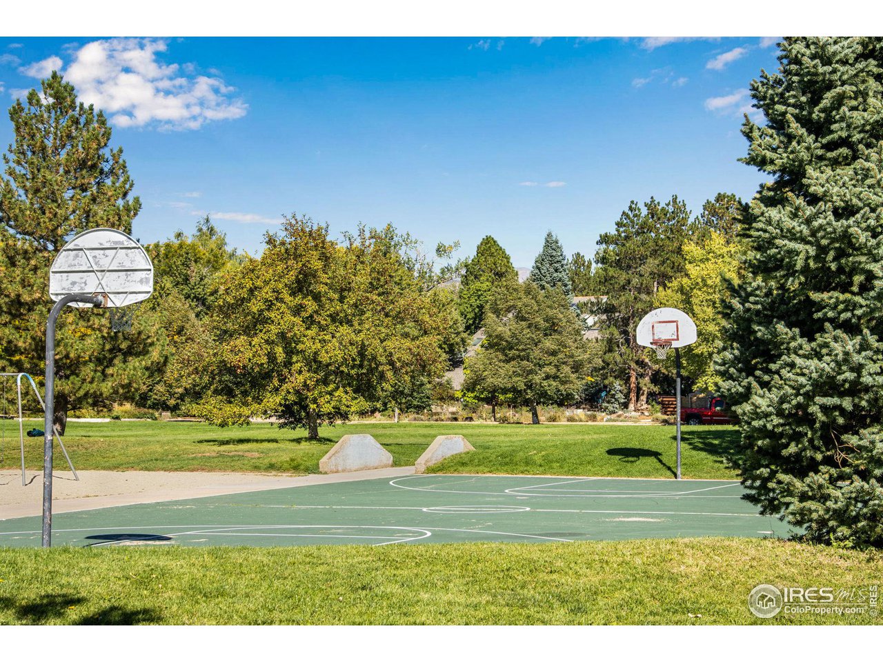 2659 Juniper Avenue, Unit 30 Boulder, CO 80304 - Photo 35 of 35 a view of a yard in front of a house with a garden