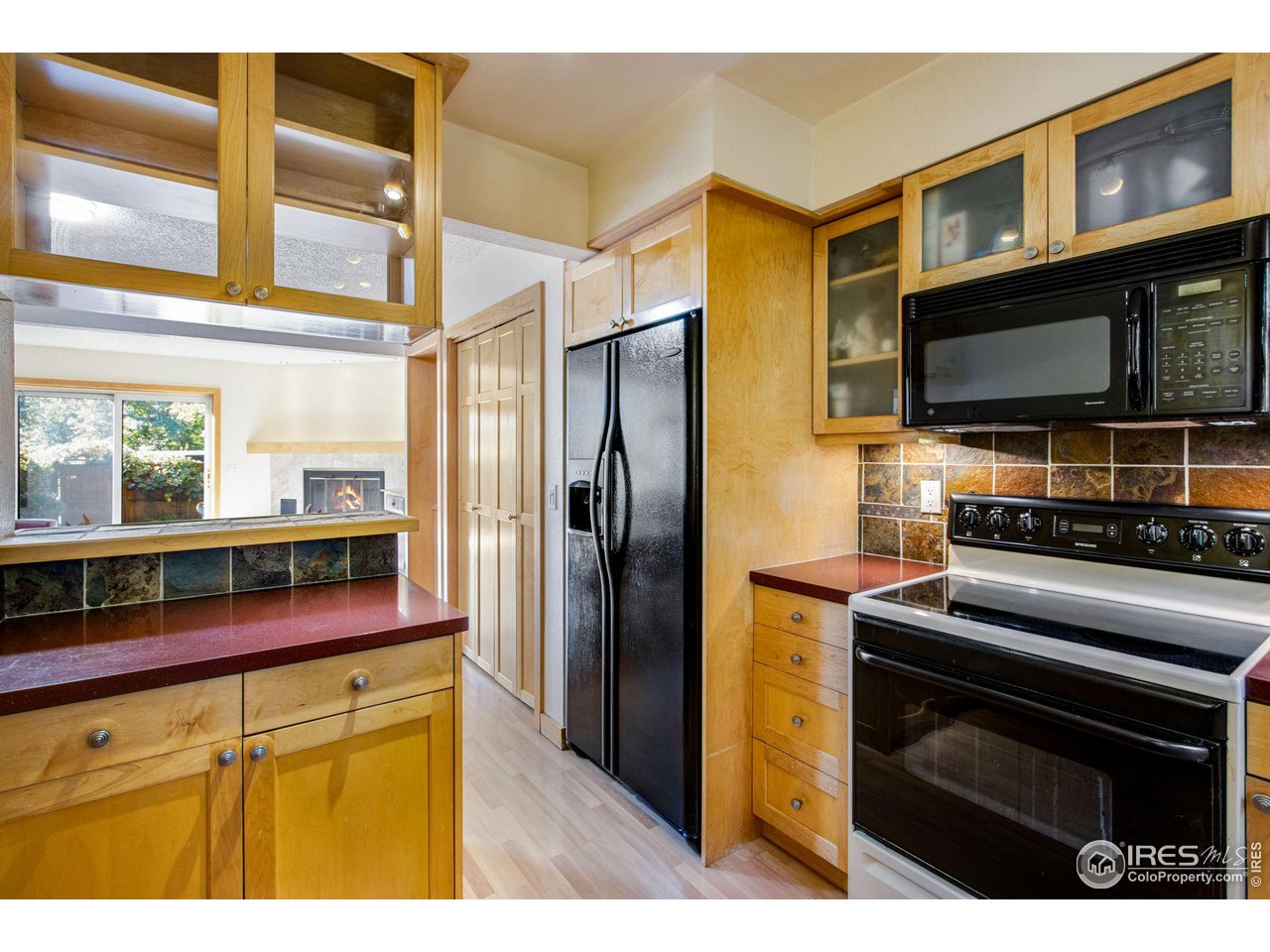 2659 Juniper Avenue, Unit 30 Boulder, CO 80304 - Photo 4 of 35 a kitchen with stainless steel appliances a stove microwave and refrigerator