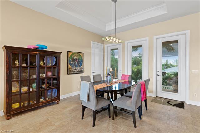 8051 Lagoon Road Fort Myers Beach, FL 33931 - Photo 14 of 29 Dining area looking out to the water