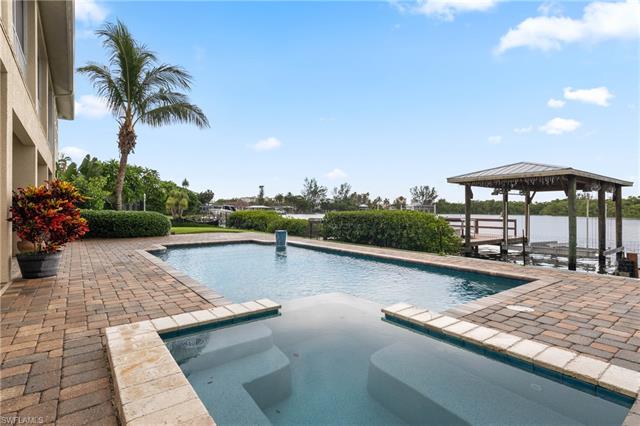 8051 Lagoon Road Fort Myers Beach, FL 33931 - Photo 6 of 29 Gorgeous pool/ hot tub