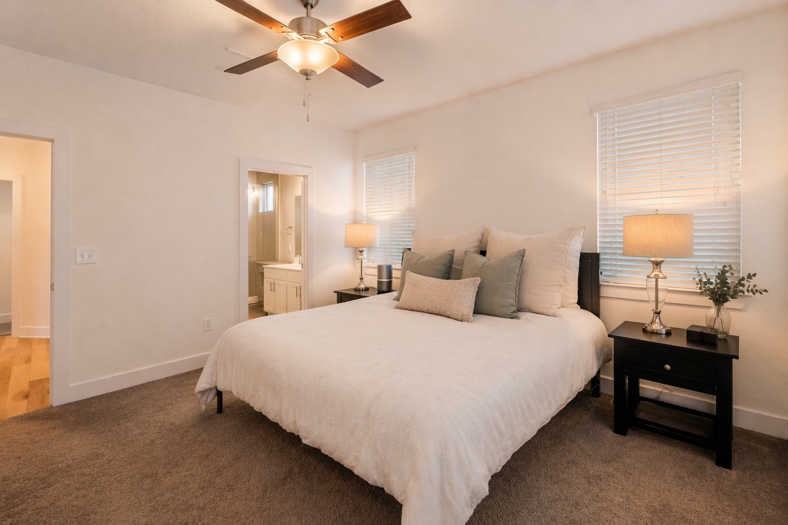2100 Hermia Street, Unit 41 Austin, TX 78741 - Photo 11 of 22 a bedroom with a bed and a chandelier