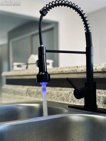 a water heater on the side of a counter top