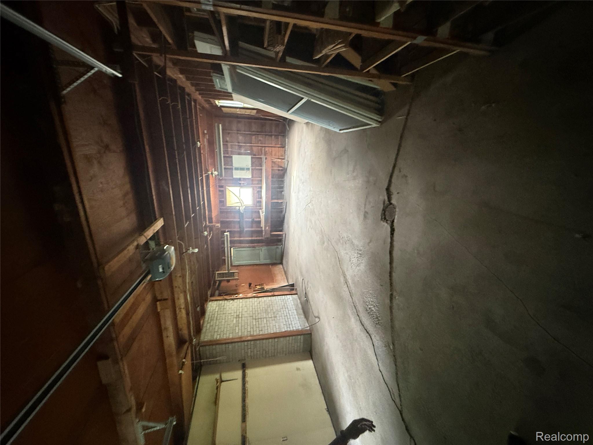3176 East Fisher Road Bay City, MI 48706 - Photo 18 of 25 Miscellaneous room with concrete flooring and a garage