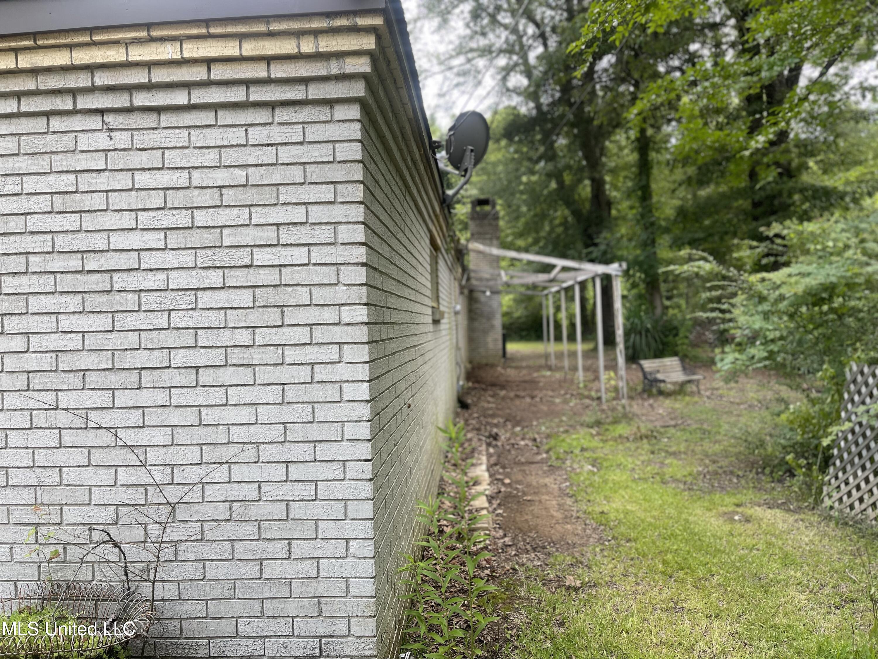 225 D E Denman Road Charleston, MS 38921 - Photo 4 of 27 Rear Side