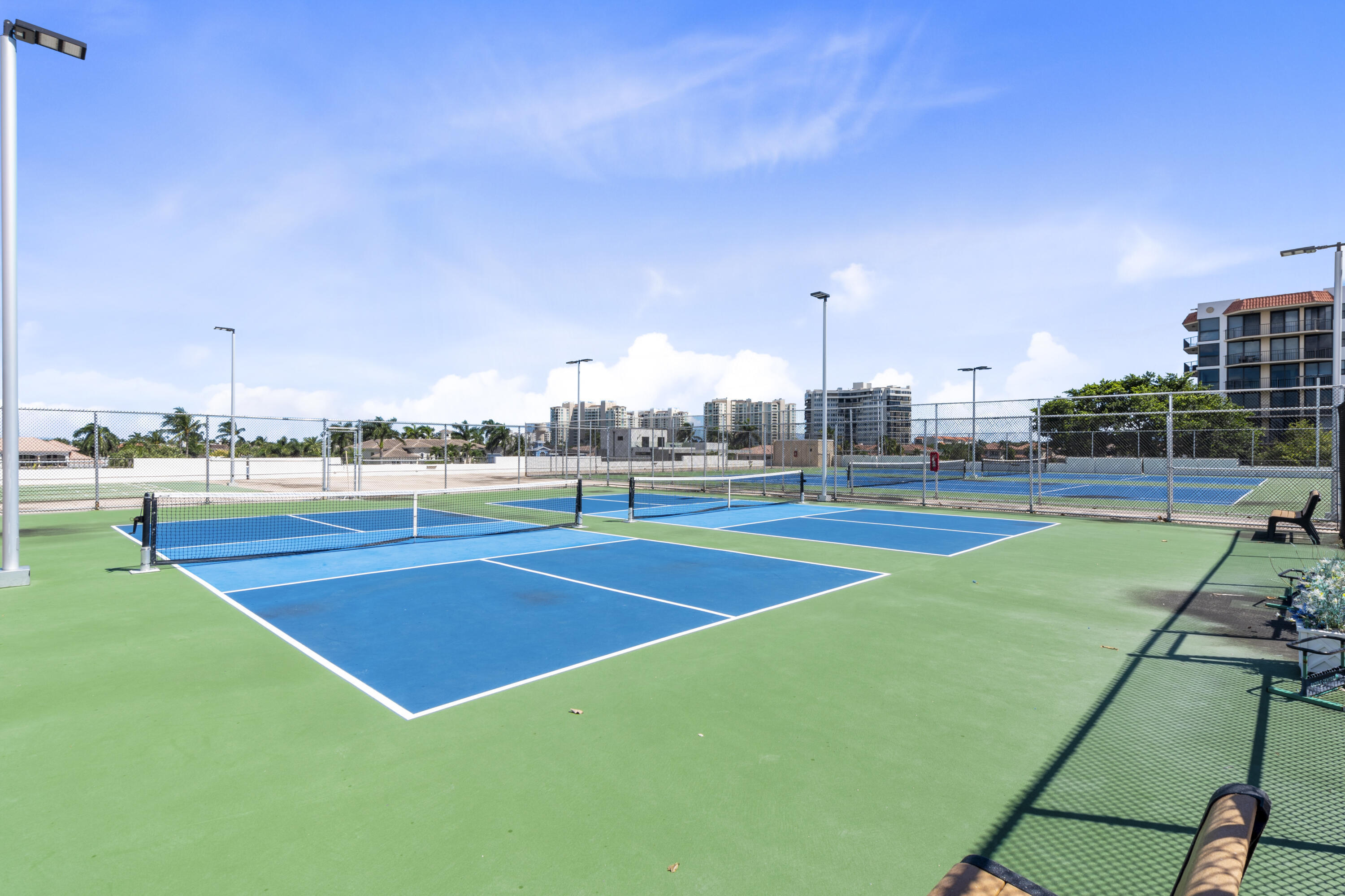 859 Jeffery Street, Unit 312 Boca Raton, FL 33487 - Photo 43 of 53 a view of a tennis court