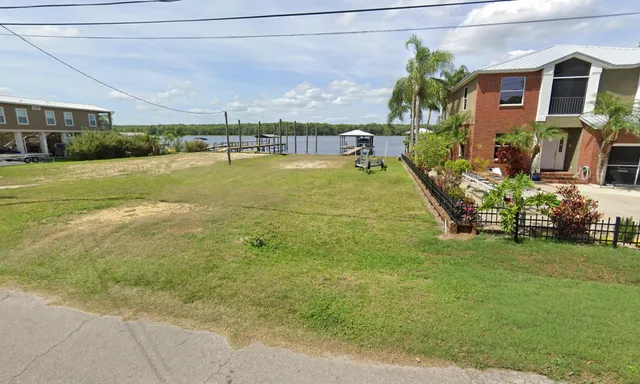 a view of a house with a swimming pool
