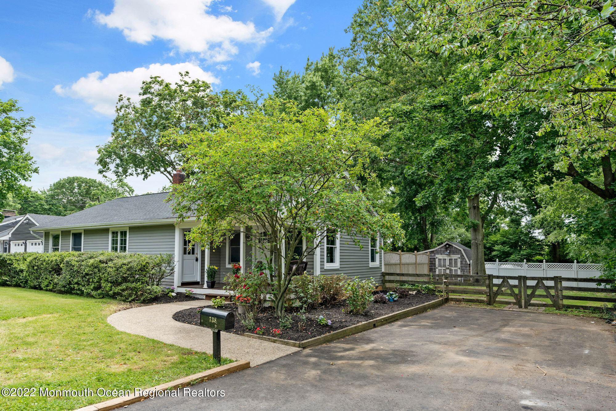 738 Holmdel Road Holmdel, NJ 07733 - Photo 27 of 36 a view of a house with backyard and sitting area