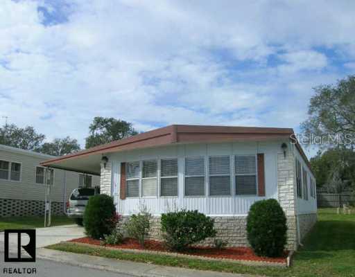 front view of a house and a yard