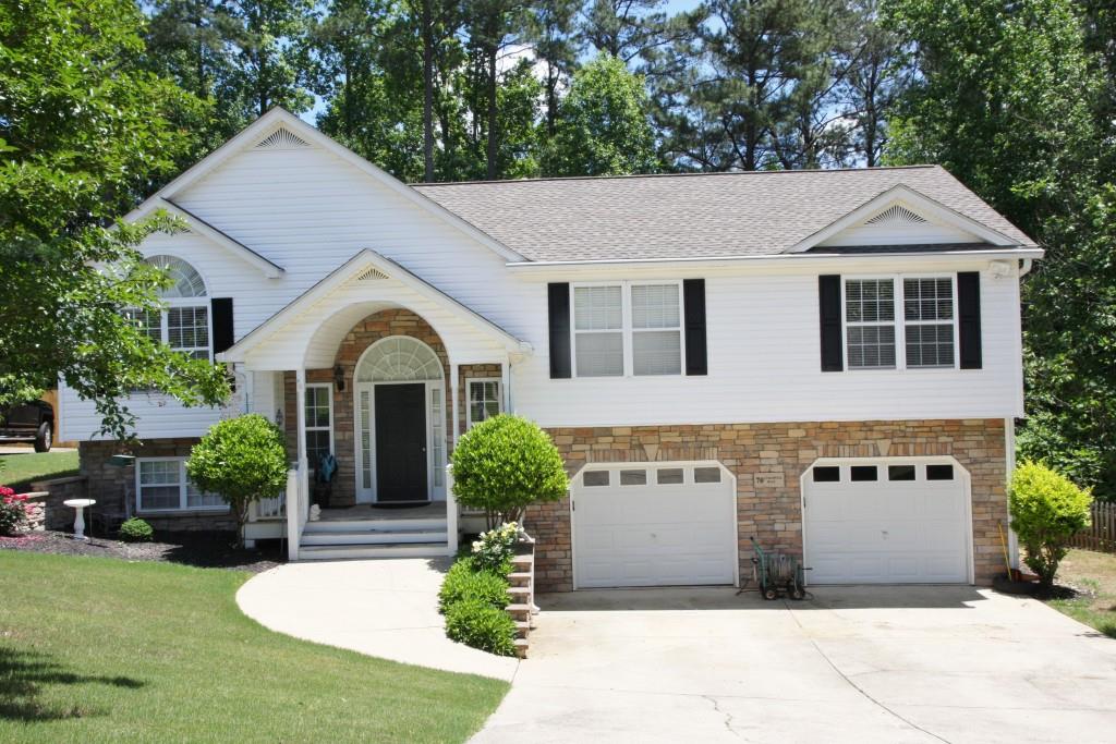 70 Colonial Way Dallas, GA 30157 - Photo 1 of 1 NEW ROOF! NEW GUTTERS & GUARDS/NEW HOT WATER HEATER/CENTRAL VAC/GREAT PRIVATE YARD W/GREEN SPACE!