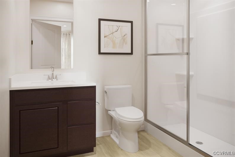 2113 Destination Drive, Unit A Sandston, VA 23150 - Photo 6 of 9 a bathroom with a sink and a toilet