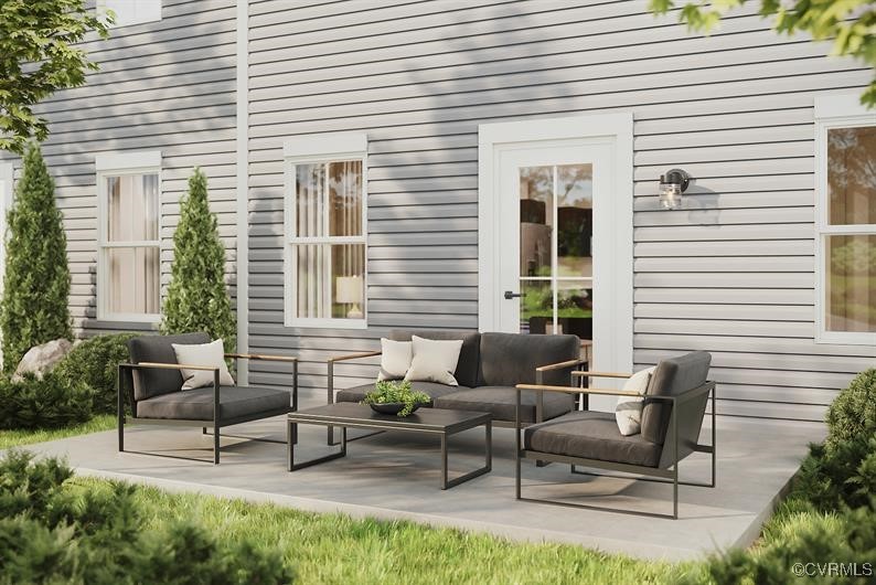 2113 Destination Drive, Unit A Sandston, VA 23150 - Photo 9 of 9 a view of a house with patio and a yard