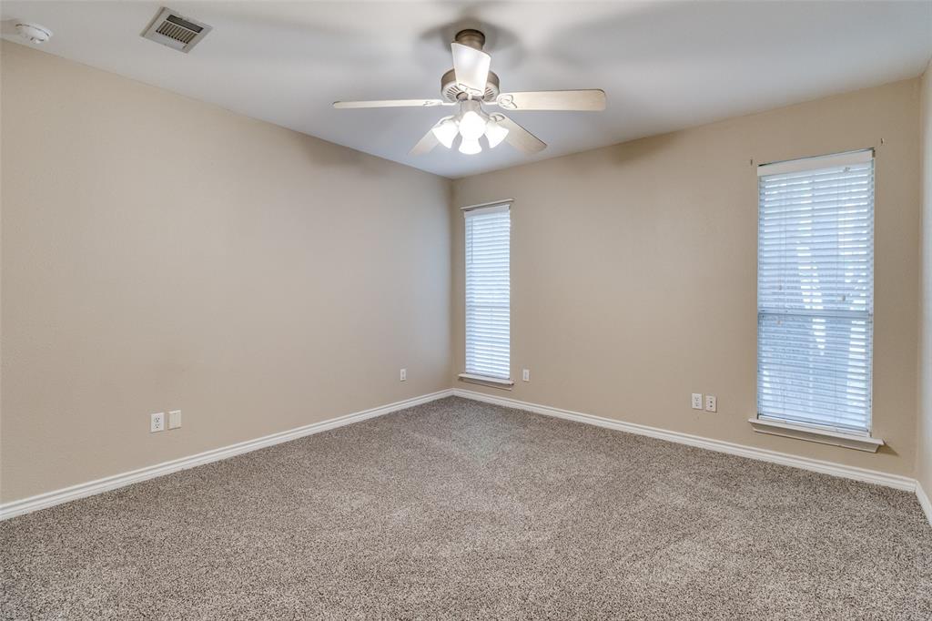 454 East Fulton Street Van Alstyne, TX 75495 - Photo 10 of 25 a view of an empty room with a window