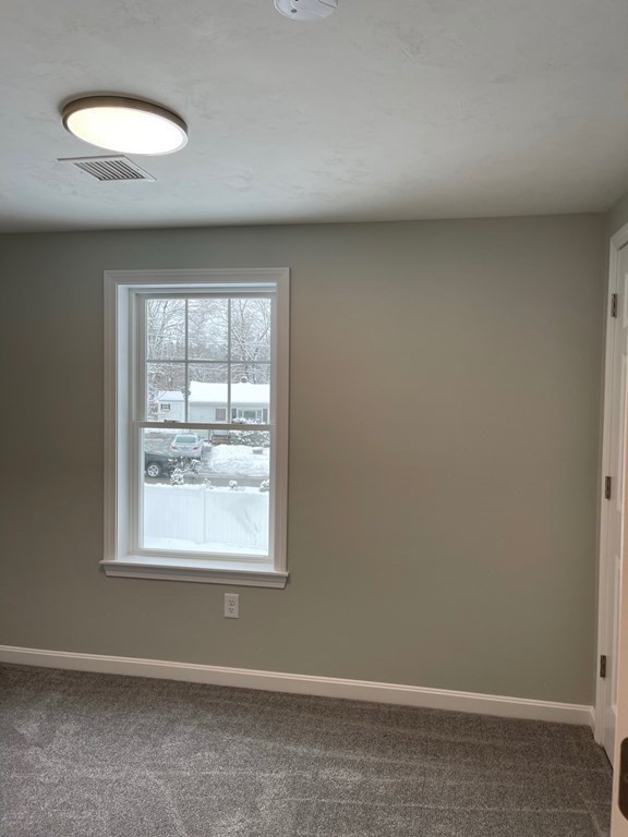 30 Markham Circle Ayer, MA 01432 - Photo 14 of 22 an empty room with a window